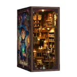 Front view of the Alchemy Master book nook with a magical side cover, featuring glowing potion shelves, wizard miniatures, wooden balconies, fantasy decorations and a detailed alchemy workshop scene.