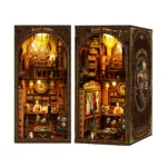 Royal Tailor DIY Book Nook Kit front and angled views showcasing luxurious tailor shop details and warm LED lighting