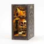 Astronomy Museum Book Nook DIY Kit displayed on a bookshelf with vintage book design, miniature observatory and warm LED lights