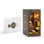 Museum of Astronomy Book Nook kit packaging and finished miniature display featuring the assembled DIY model with warm LED lighting.