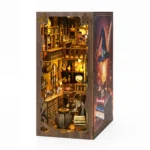 Magic Night Book Nook front angle final display featuring illuminated miniature rooms, potion shelves, wizard decorations and fantasy details.
