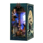 Underwater World Book Nook open book display featuring a sailing ship cover, miniature shipwreck scene, ocean ruins and glowing LED lights.