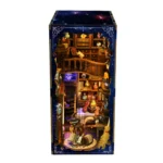 Magic Potion Book Nook front view finished display with illuminated shelves, colorful potion bottles and detailed miniature interior
