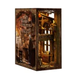Serenity Coffee House book nook dual side display, featuring a vintage coffee house exterior, warm LED lighting, wooden architecture and detailed miniature decorations for bookshelf display.