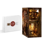 Serenity Coffee House book nook DIY kit packaging and finished model display, showcasing the miniature coffee house scene with warm lighting, wooden details and realistic bookshelf decoration.
