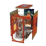 Tang Dynasty Book Nook DIY Kit assembly showing miniature Chinese palace parts, red architecture panels, lanterns and detailed crafting pieces