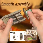 Hands assembling a miniature shelf for the coffee shop DIY kit using precut wooden pieces and a step-by-step illustrated instruction guide.