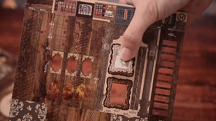 Animated view of the Magical Night DIY book nook showing the assembly process, miniature fantasy details, and the completed illuminated model.