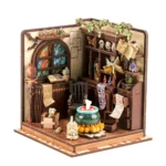 Angled view of the completed Magic Potion Workshop DIY miniature featuring a bubbling cauldron, stained-glass window, potion bottles, magical books, butterflies, hanging pages, and alchemy decorations.
