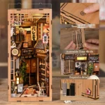 DIY Japanese Alley with Cat kit featuring a touch switch, detailed assembly components, an estimated build time of 4 to 6 hours, and a hidden battery compartment.